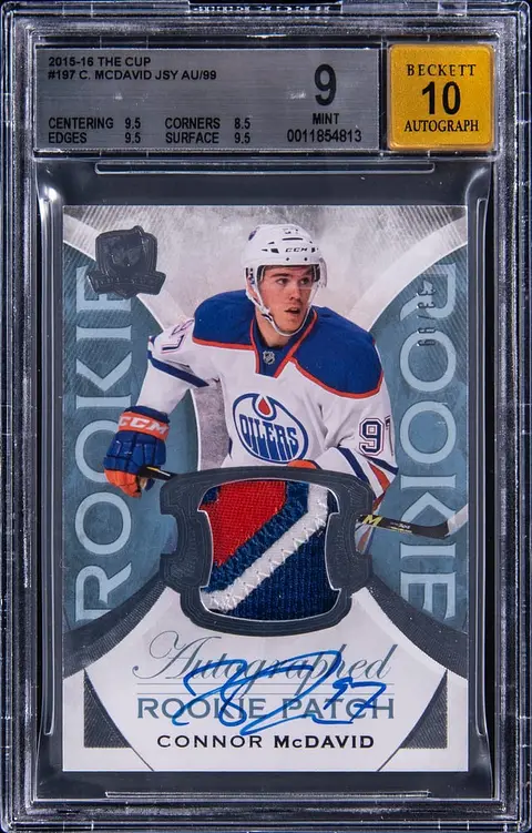 2015-16 Upper Deck The Cup Rookie Patch Autograph (RPA) #197 Connor McDavid Signed Patch Rookie Card (#33/99) - BGS MINT 9, Beckett 10