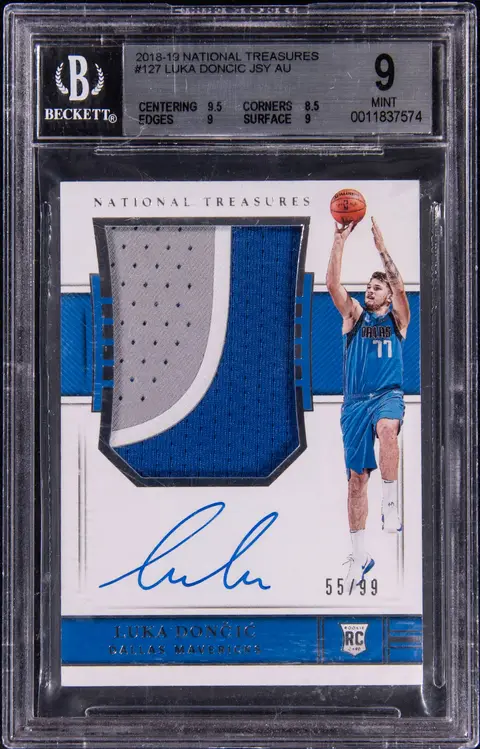 2018-19 Panini National Treasures Jersey Autographs #127 Luka Doncic Signed Patch Rookie Card (#55/99) - BGS MINT 9